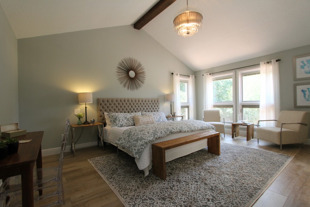 The Master bedroom with nice wood tones in a relaxing calming atmosphere